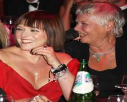 Judi Dench consuming alcohol